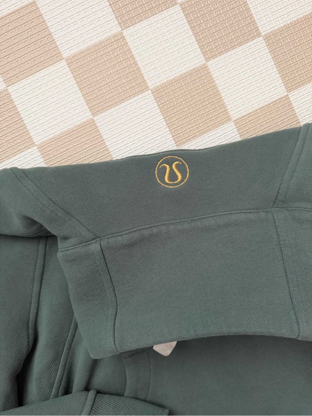 lululemon athletica Women's scuba sweater in Deep Green with Gold Logo